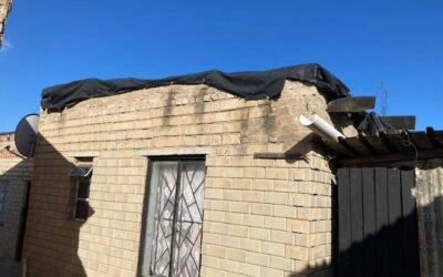 Raising the roof: Church residence gets new roof