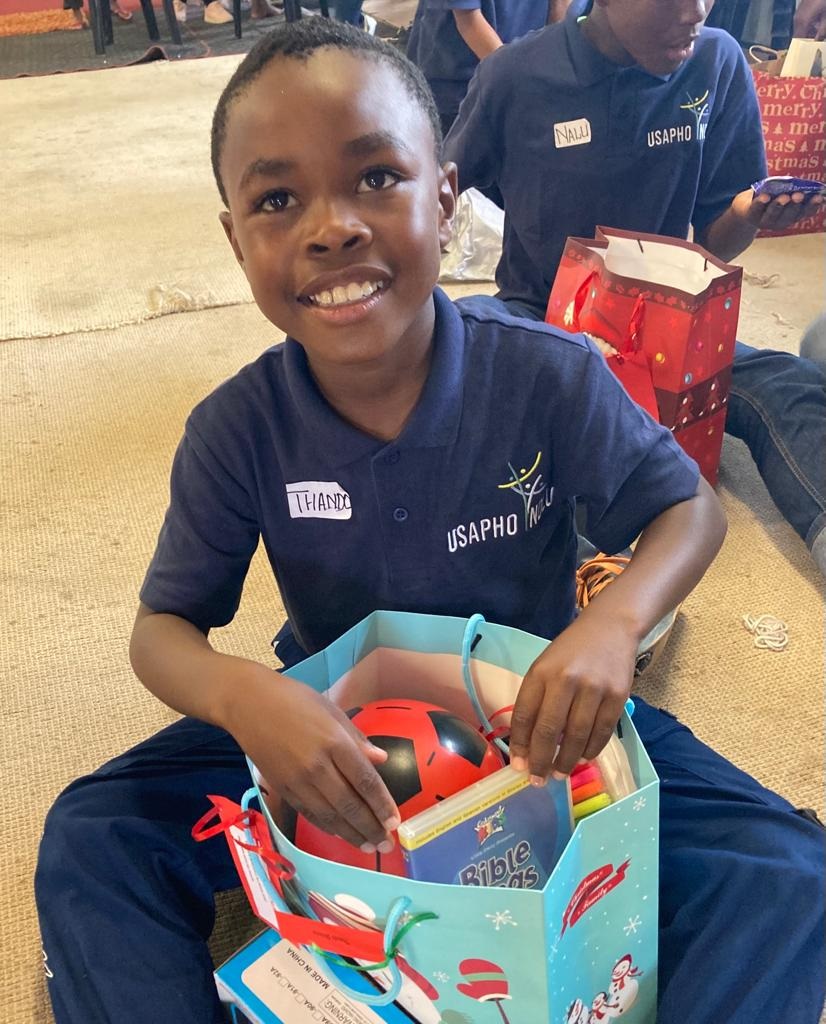A smile that says it all at Usapho Indlu's Christmas party last year. Photo supplied