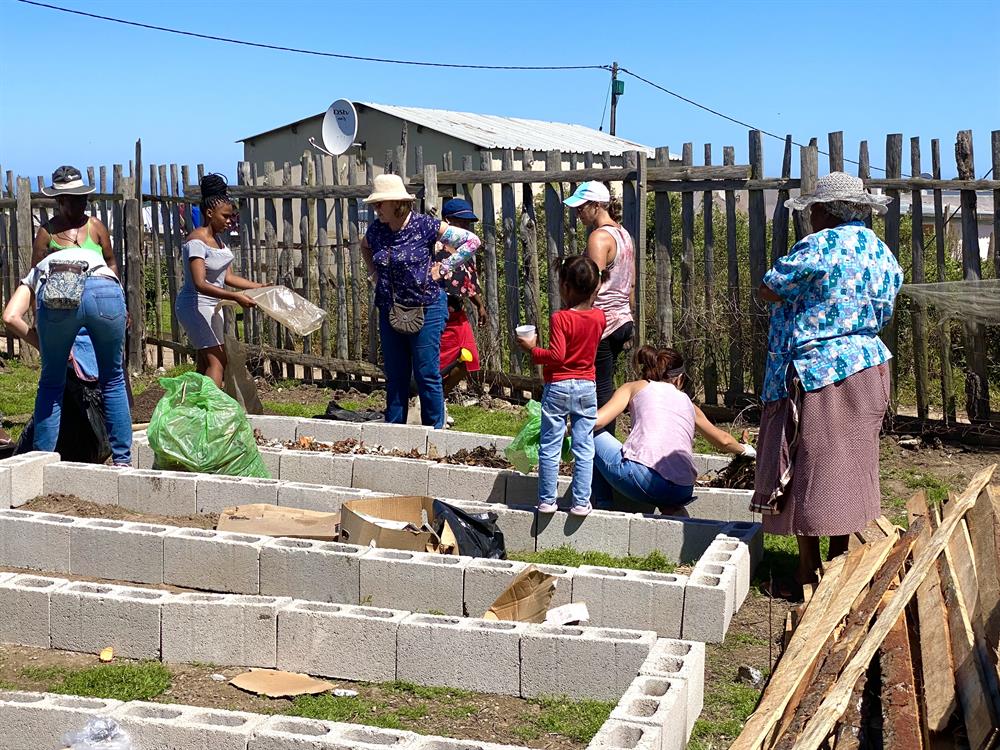 Construction of new vegetable beds for the community food garden in Thembalethu.